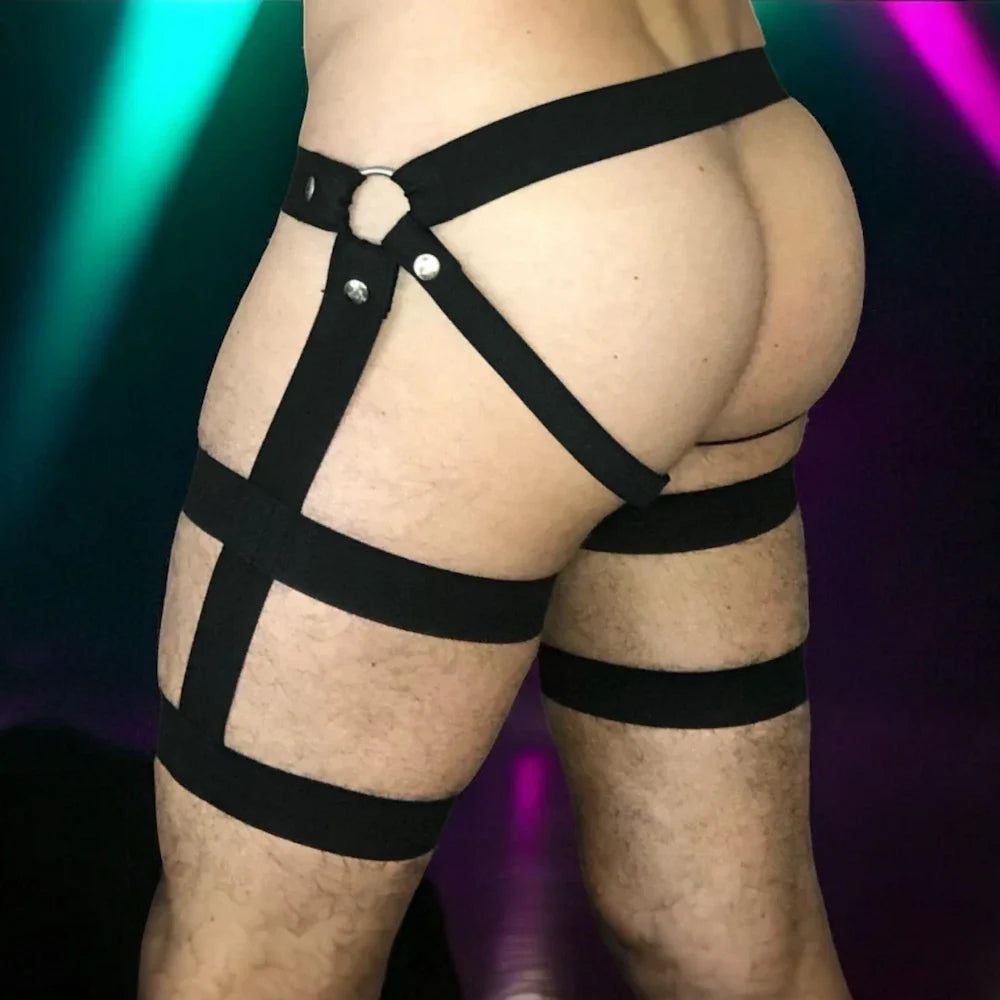 Man wearing black elastic harness shorts with garter and thigh straps