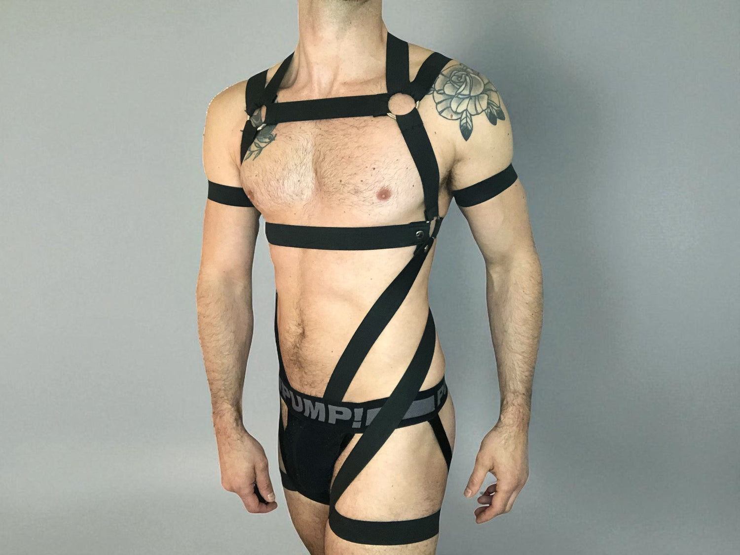 Made-to-measure interchangeable elastic body harness with removable chest and lower body straps in multiple configurations.