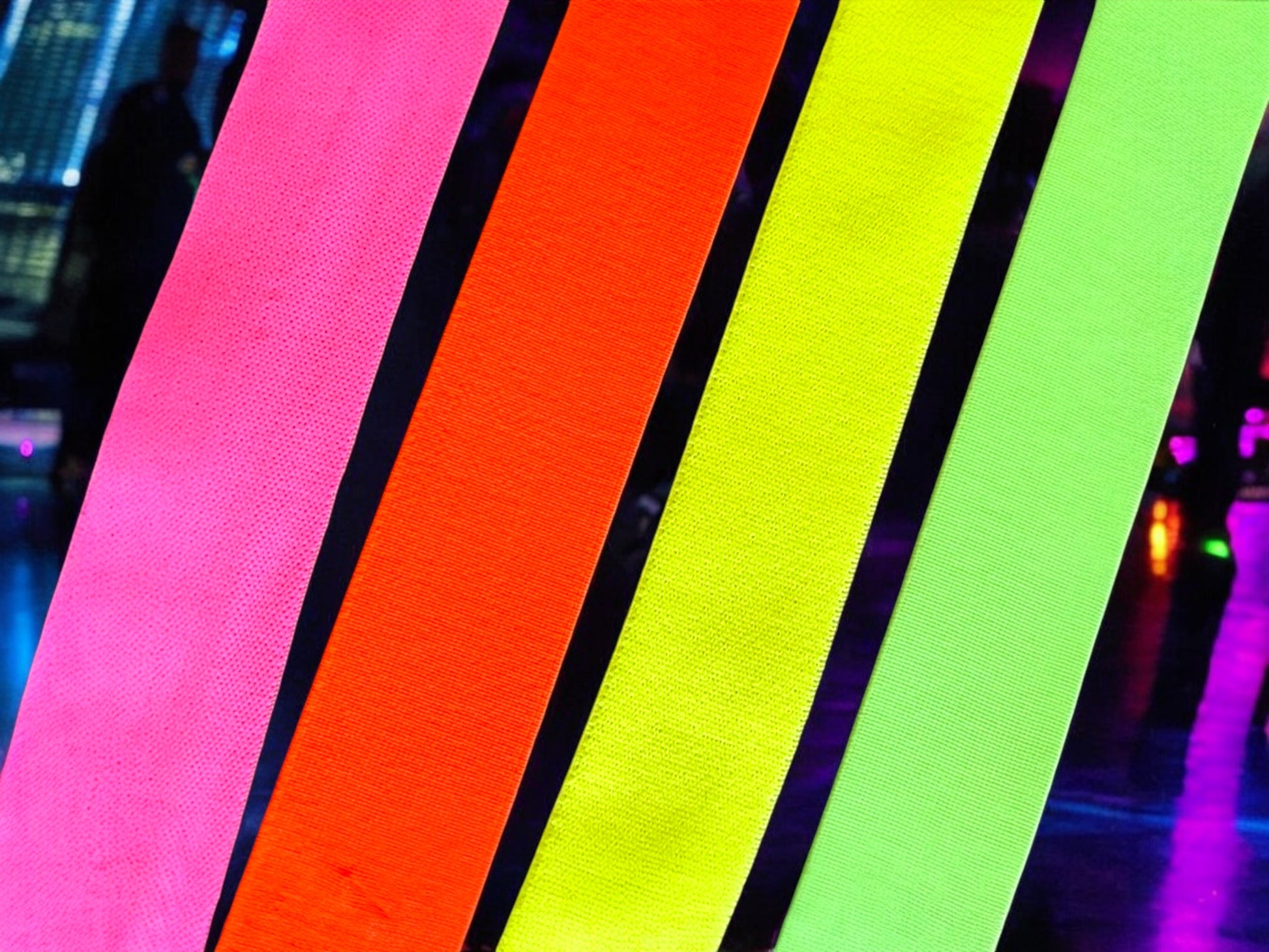 Close-up colour chart showing the four UV-reactive elastic accent choices: Neon Pink, Neon Orange, Neon Yellow and Neon Green.