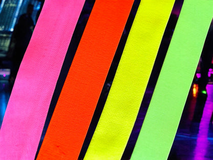 Close-up colour chart showing the four UV-reactive elastic accent choices: Neon Pink, Neon Orange, Neon Yellow and Neon Green.