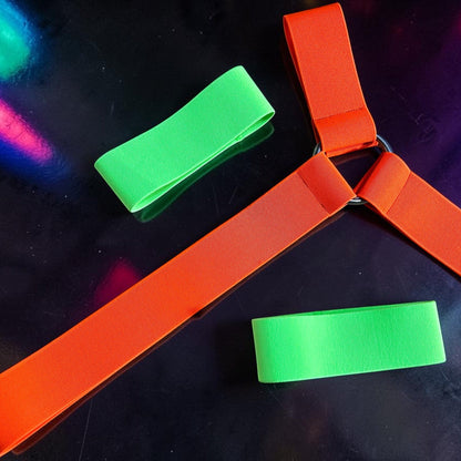UV-reactive Spartan-style chest harness flatlay