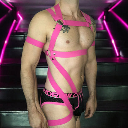 Man Wearing a Made-To-Measure Hot Pink Elastic Body Harness with Metal Rings and Matching Bicep Bands by Cheeky Boy Harness