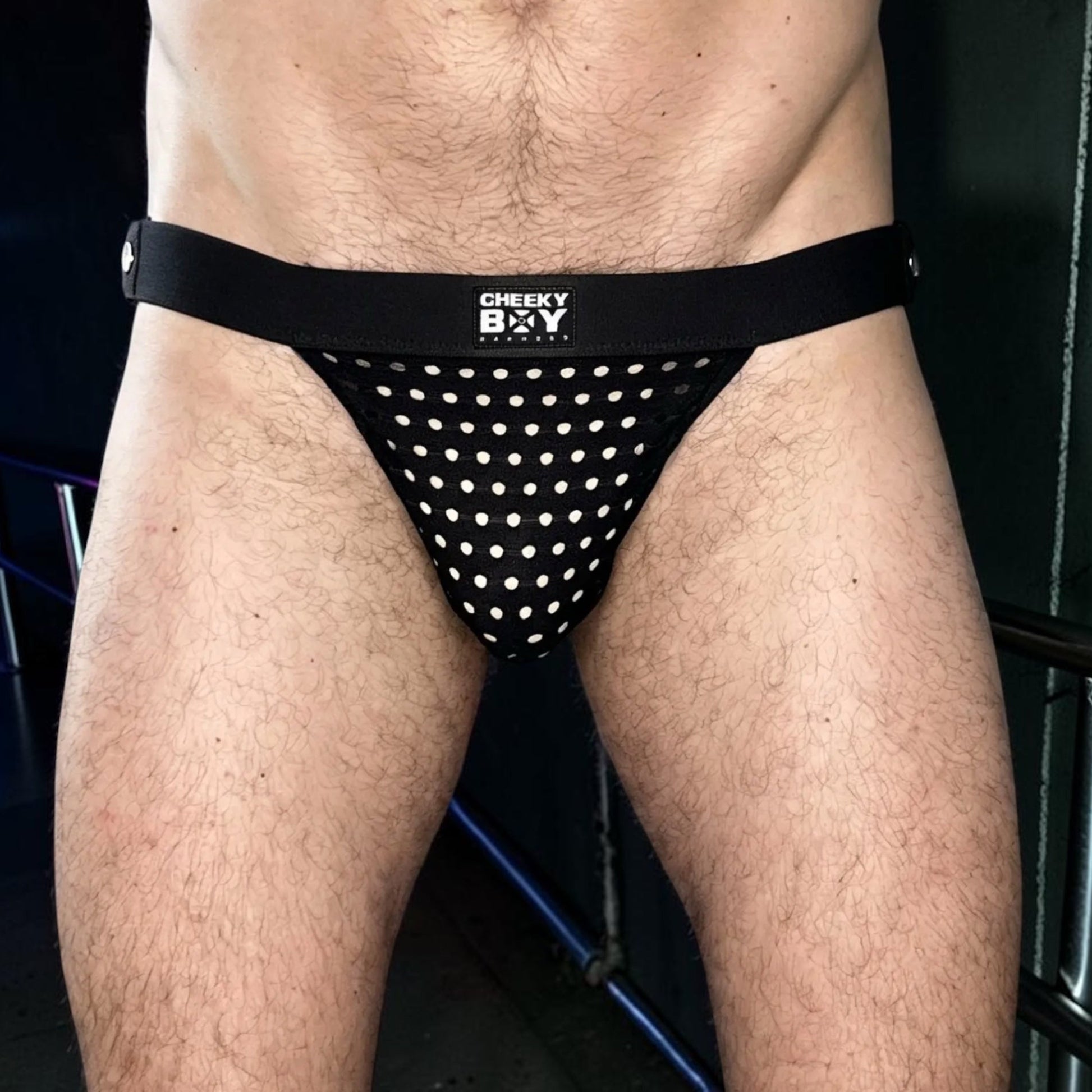 Front view of the optional black Mesh Jockstrap worn separately from the modular Full Body Harness.